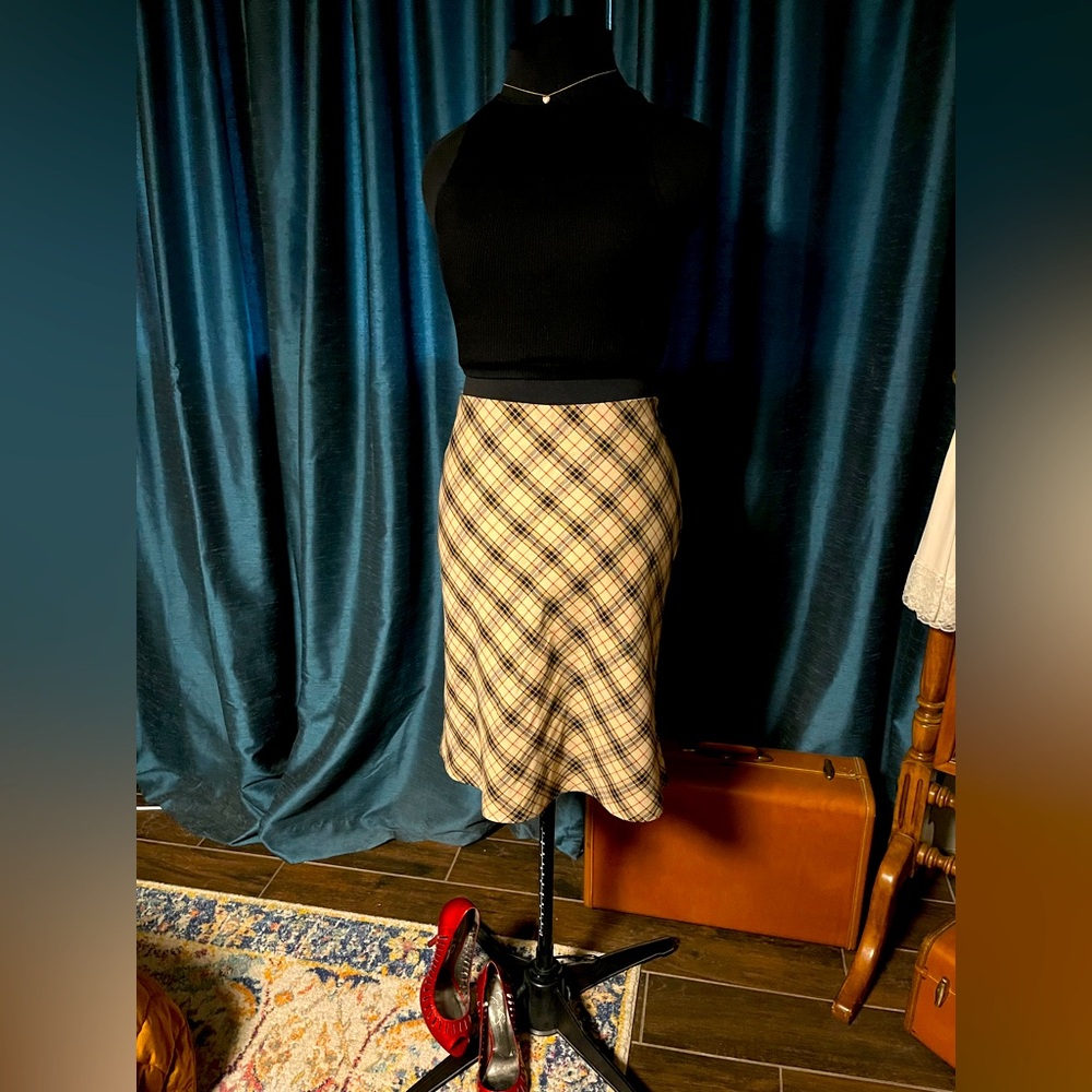 Tan skirt with black and red plaid
